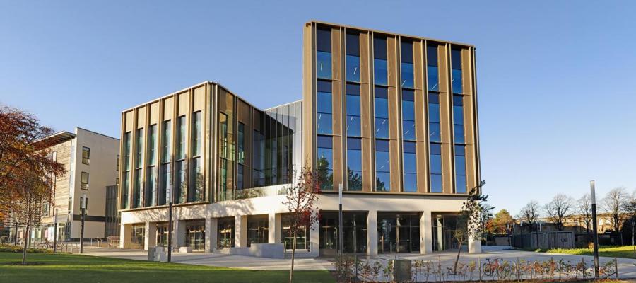 A wide angle photograph of the Nucleus Building within King's Building campus at the University of Edinburgh